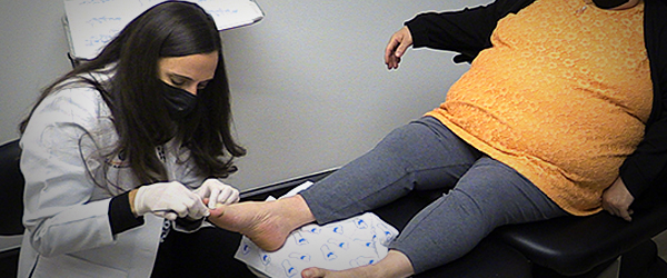 OCfeet.com – OCFA – Dr.Wilvang_with Patient_Huntington Beach & Tustin Office Dr. Wilvang with patient